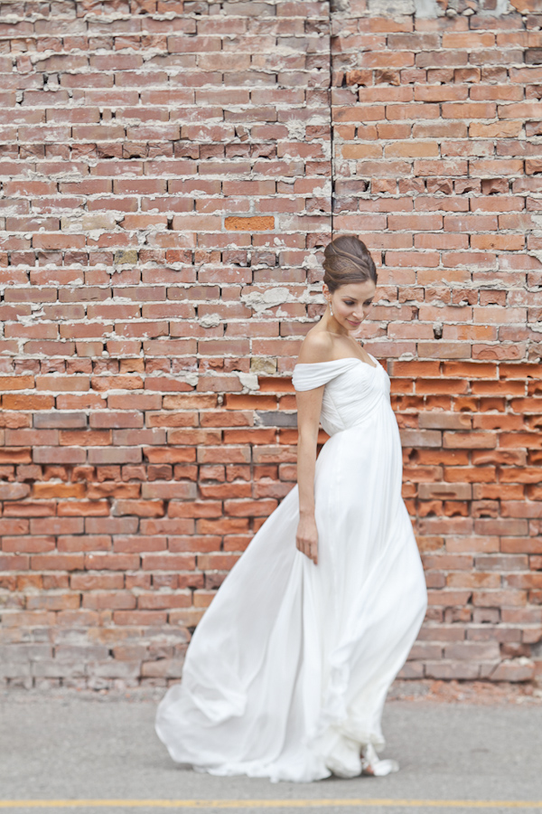 Elegant bridal portrait against a brick wall- wedding photo by top Canadian wedding photographer Rebecca Wood